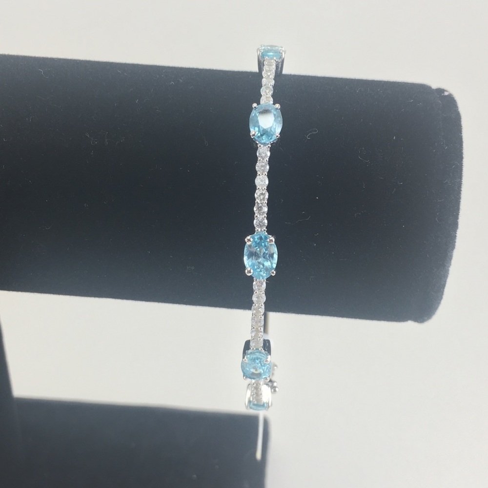 Sterling silver and blue topaz bangle bracelet